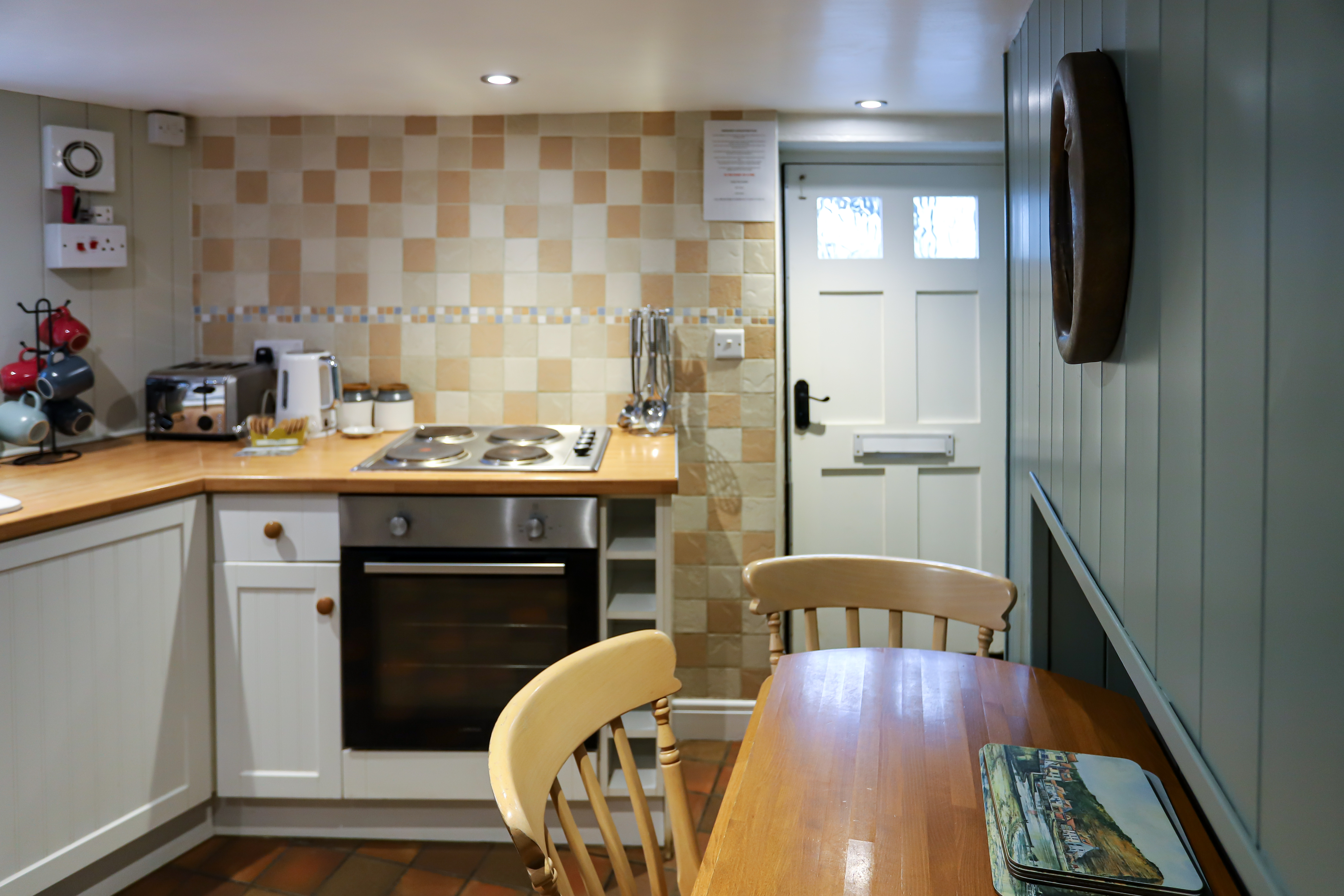 Backdoorintokitchenatdockcottage