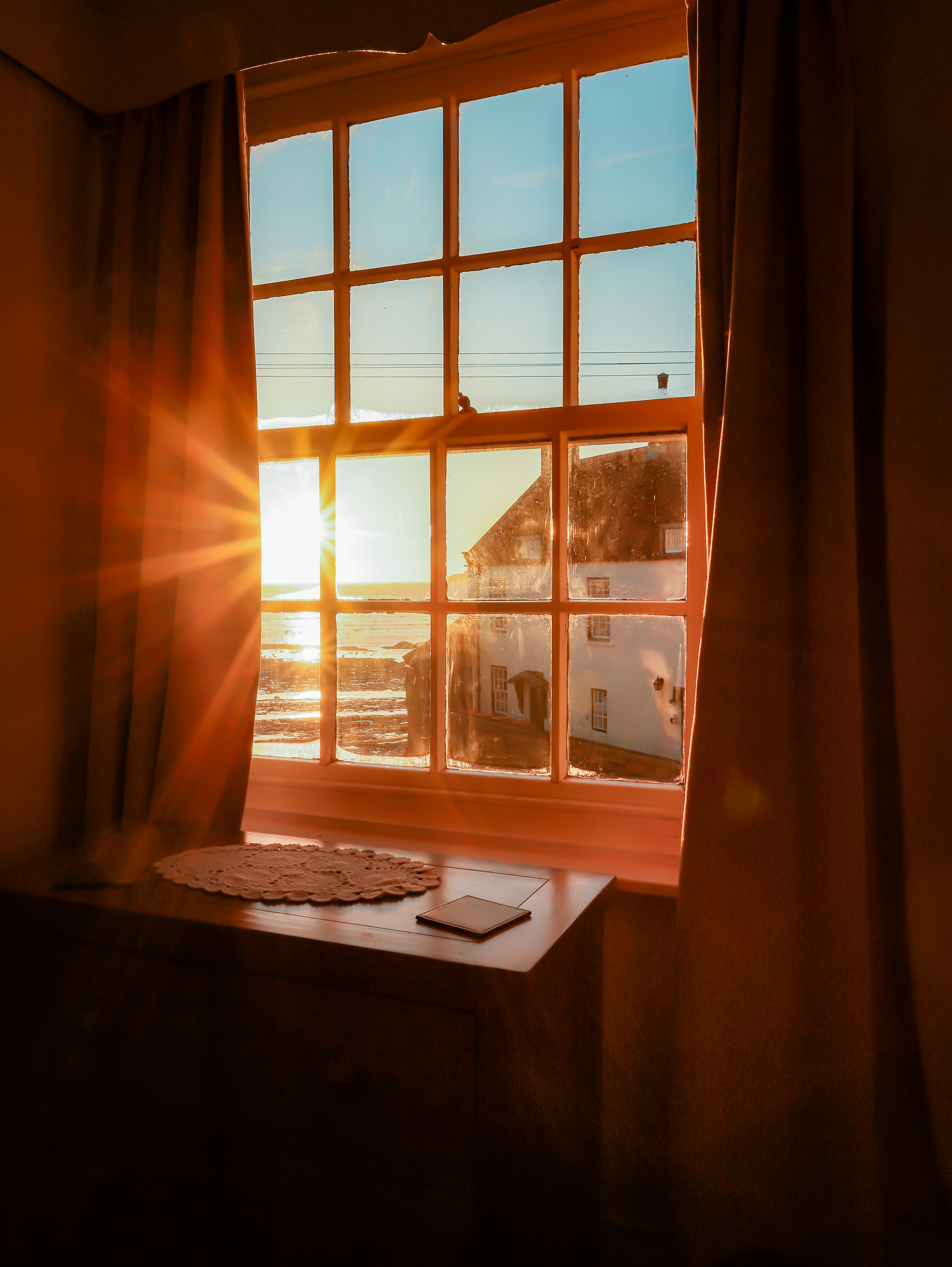 Sunriseoutoftheloungewindowatdockcottage